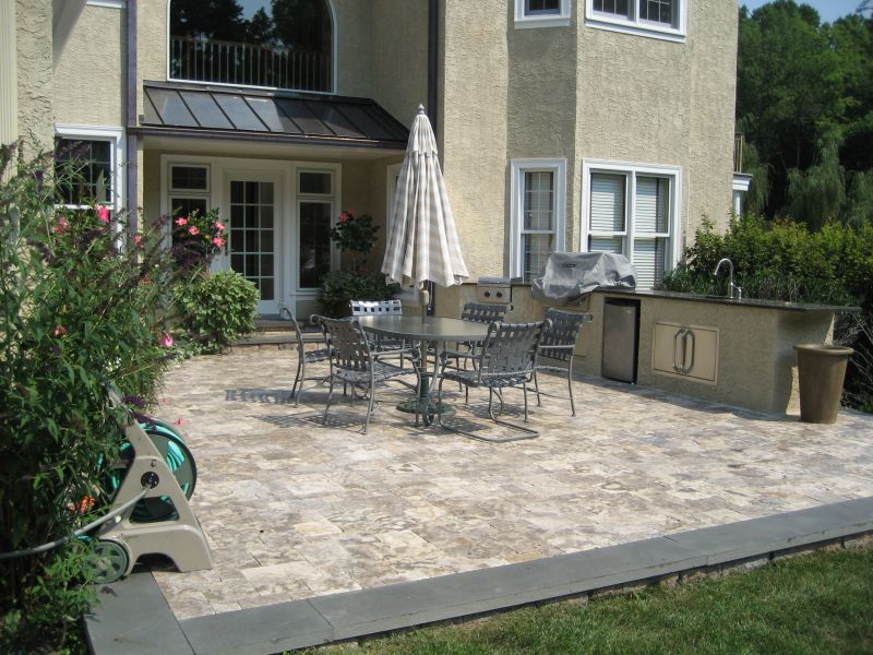 What do you put under pavers so they don't move