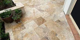 How do you prepare the ground for pavers