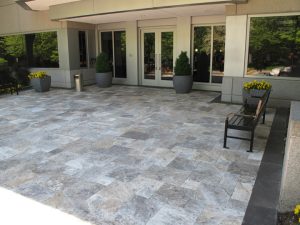 Can you power wash outdoor travertine pavers