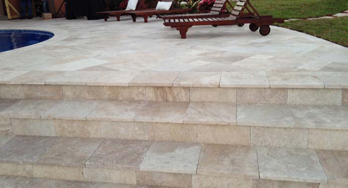 What to fill holes in travertine pavers with