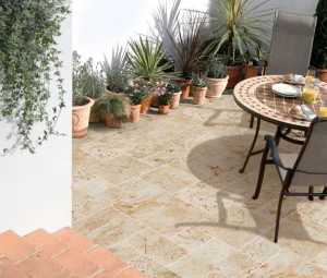 Do weeds grow between travertine pavers