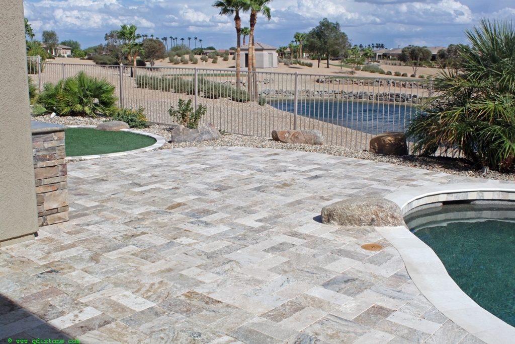 Does sealing travertine pavers change the color