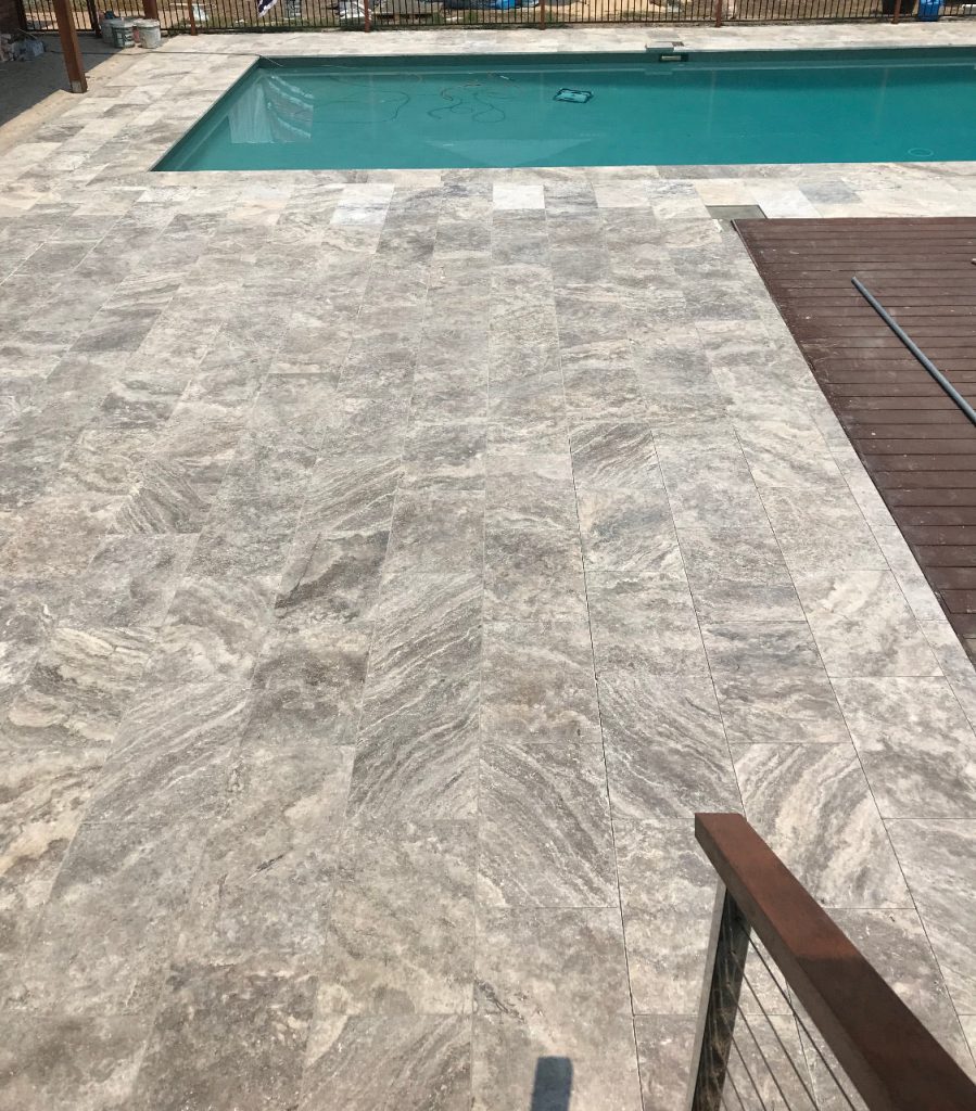 Should you fill travertine paver holes