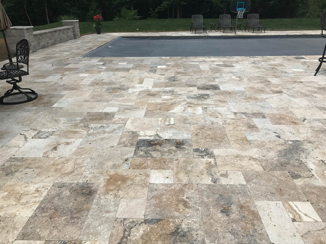 How do I permanently get rid of weeds between travertine pavers