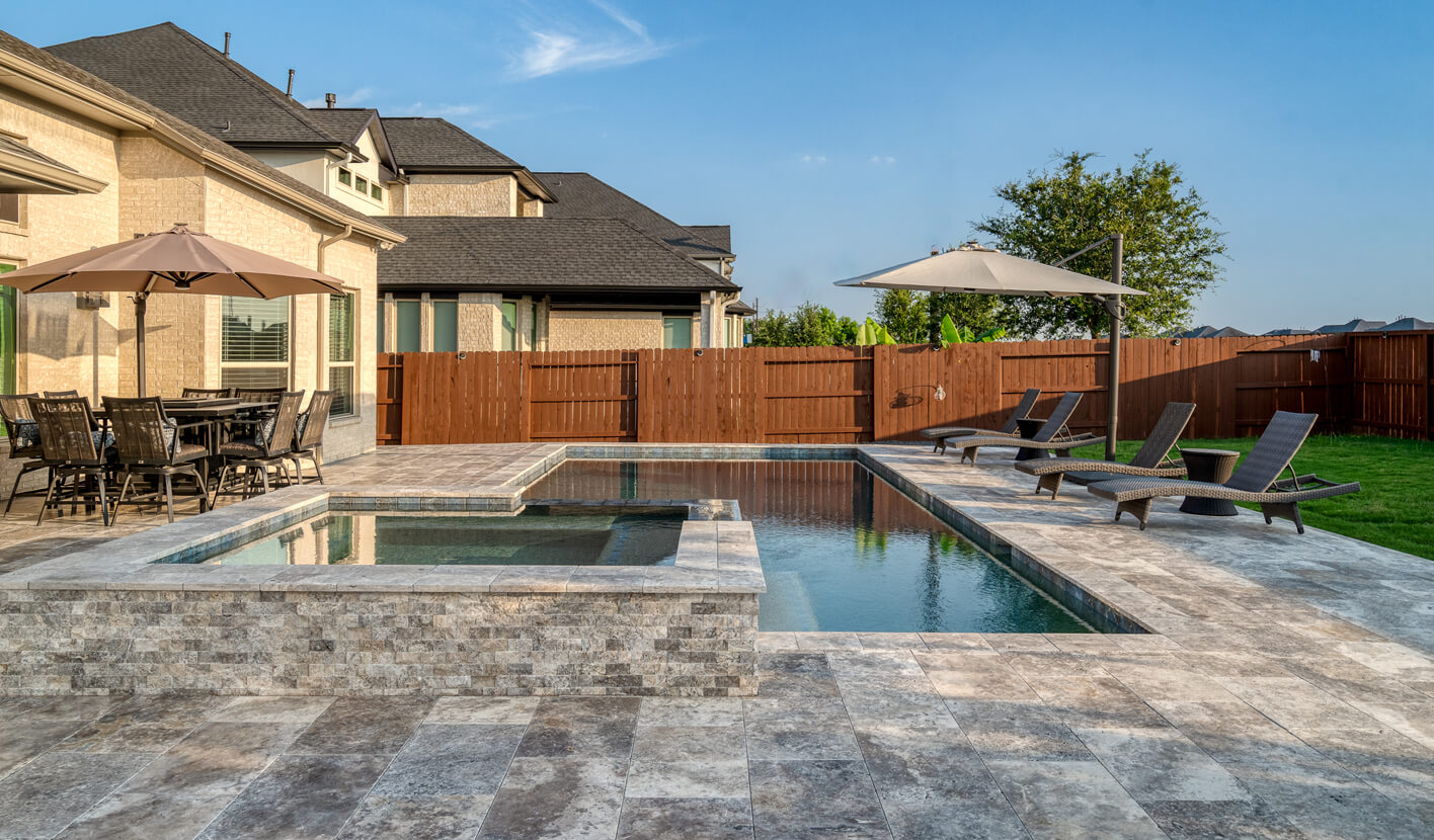How do professionals clean travertine pavers