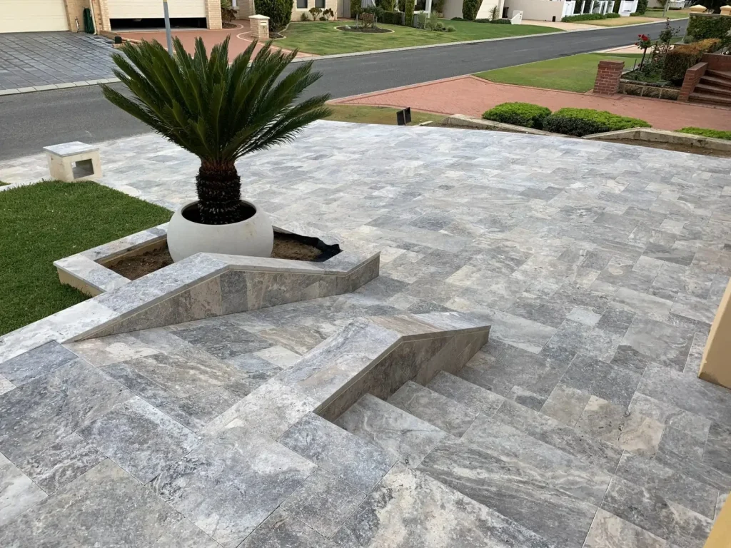 What is the best material to put between travertine pavers